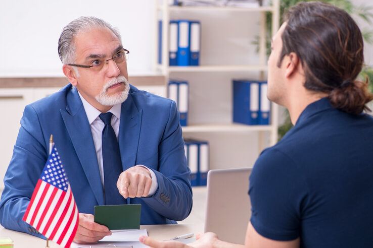Young Man Visiting Embassy For Visa