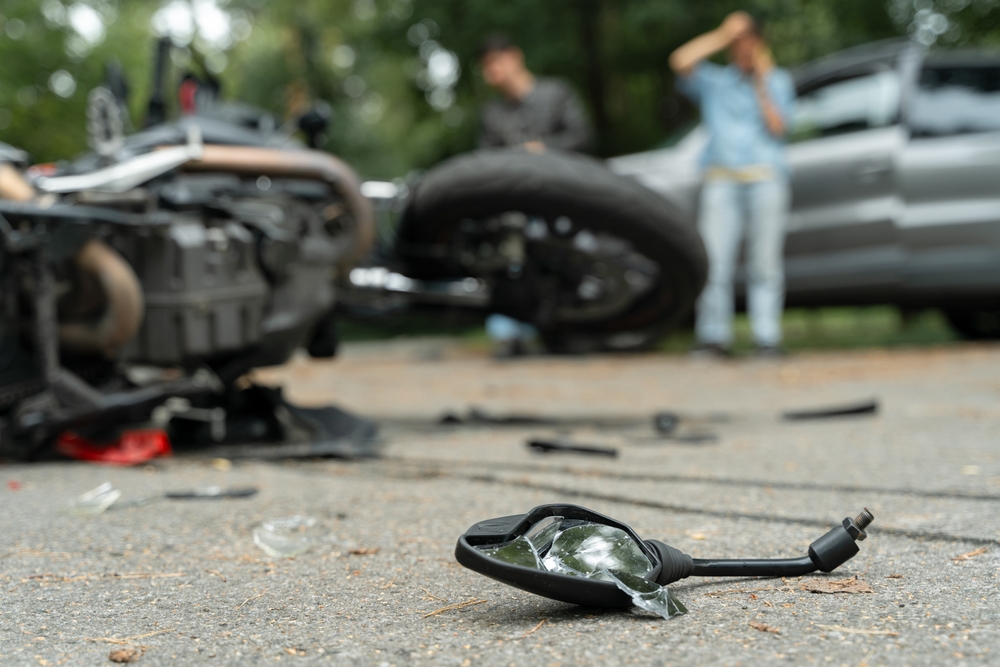 Motorcycle accident scene illustrating how crashes often result in injury or death.